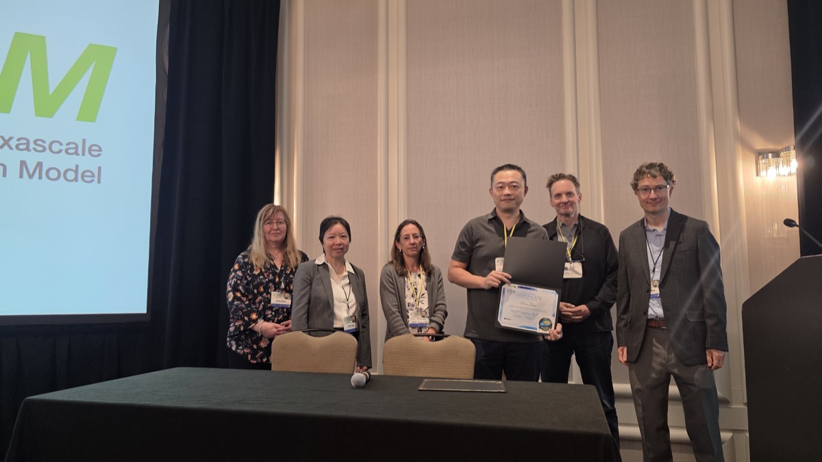 Receiving the first AI in Action award at the E3SM all-hands meeting in Bethesda, MD